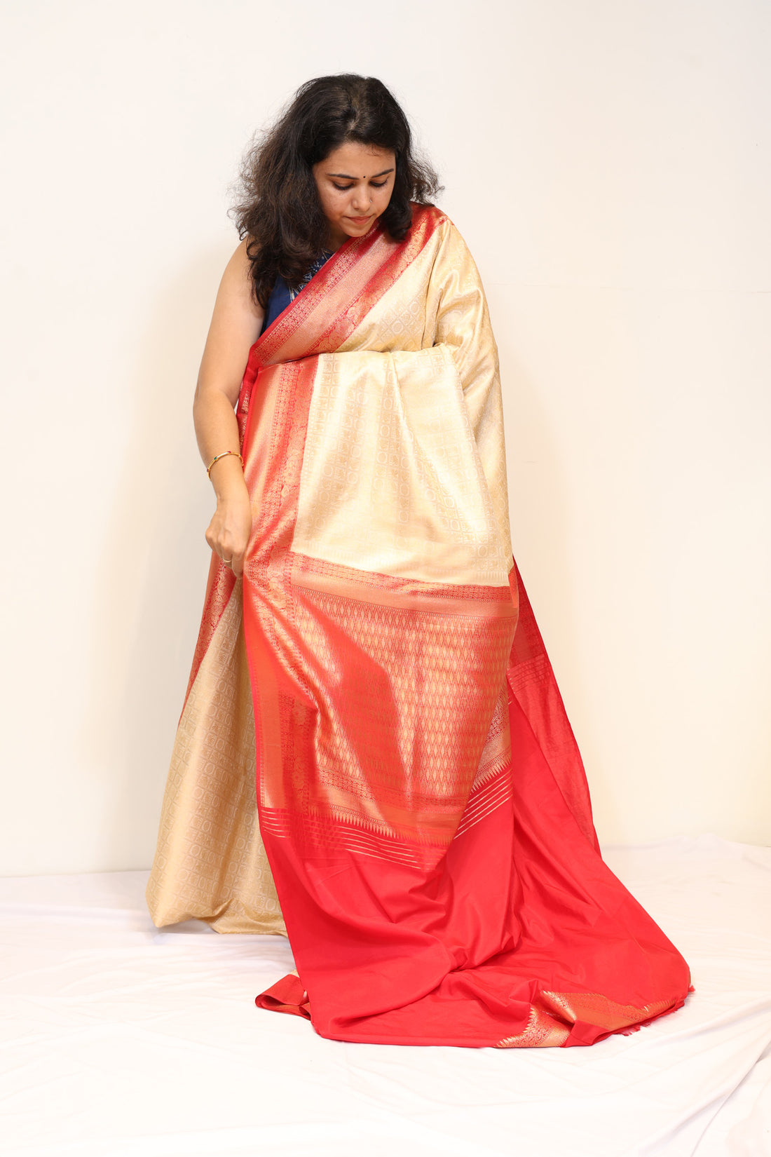 Cream Banarasi Kubera Silk Saree with Coral Red Zari Border