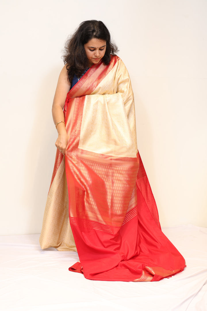 Cream Banarasi Kubera Silk Saree with Coral Red Zari Border