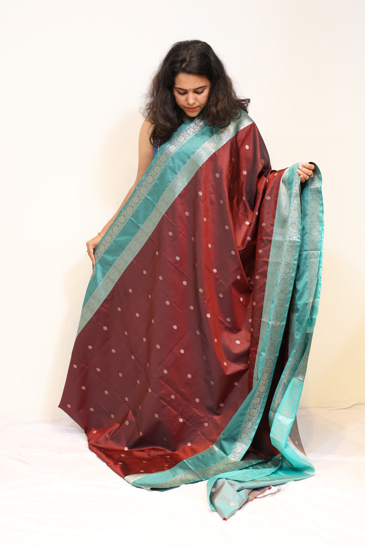 Maroon Semi Katan Saree with Aqua Blue Zari Border