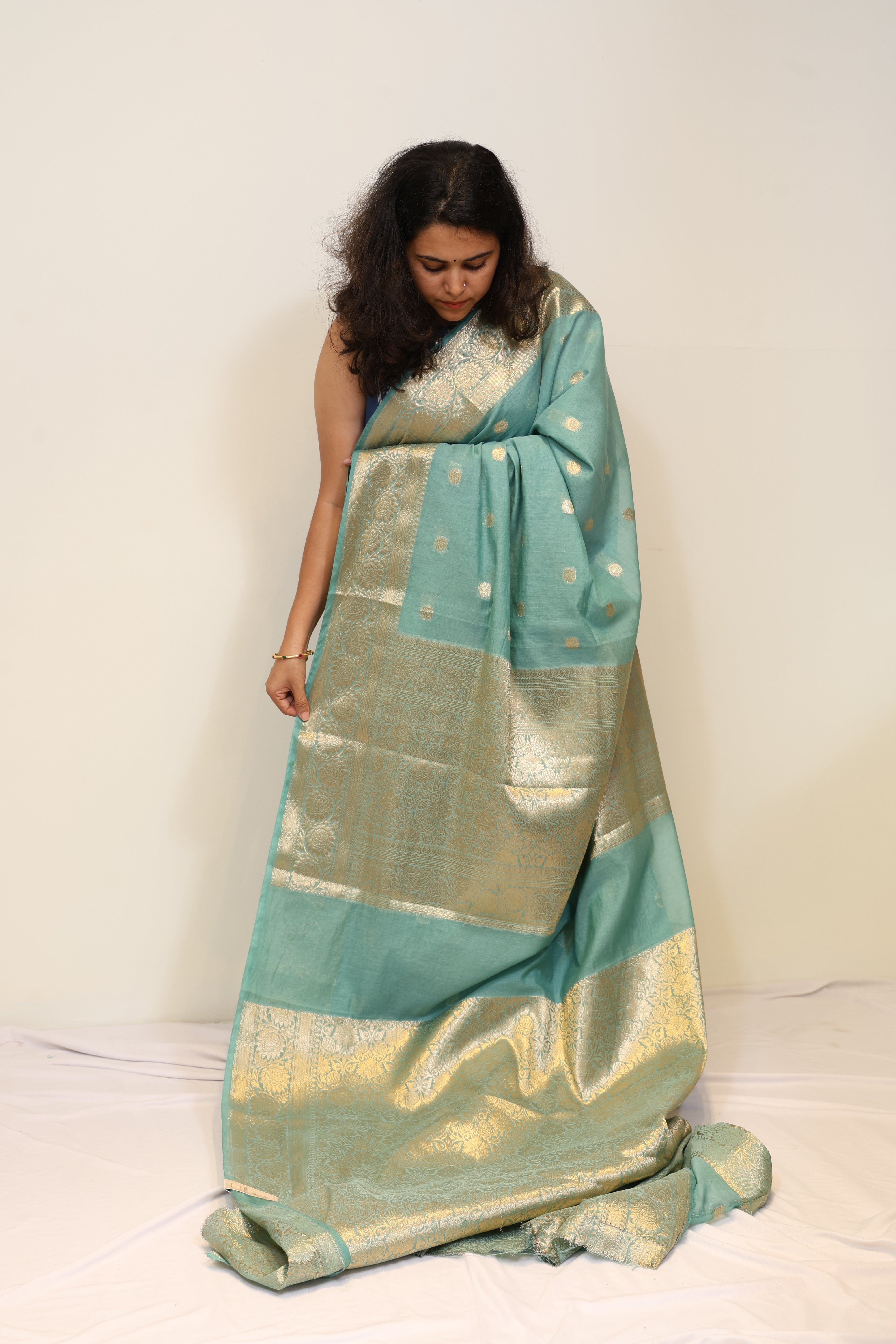 Teal Green Banarasi Mul Cotton Saree with Rich Golden Zari Border